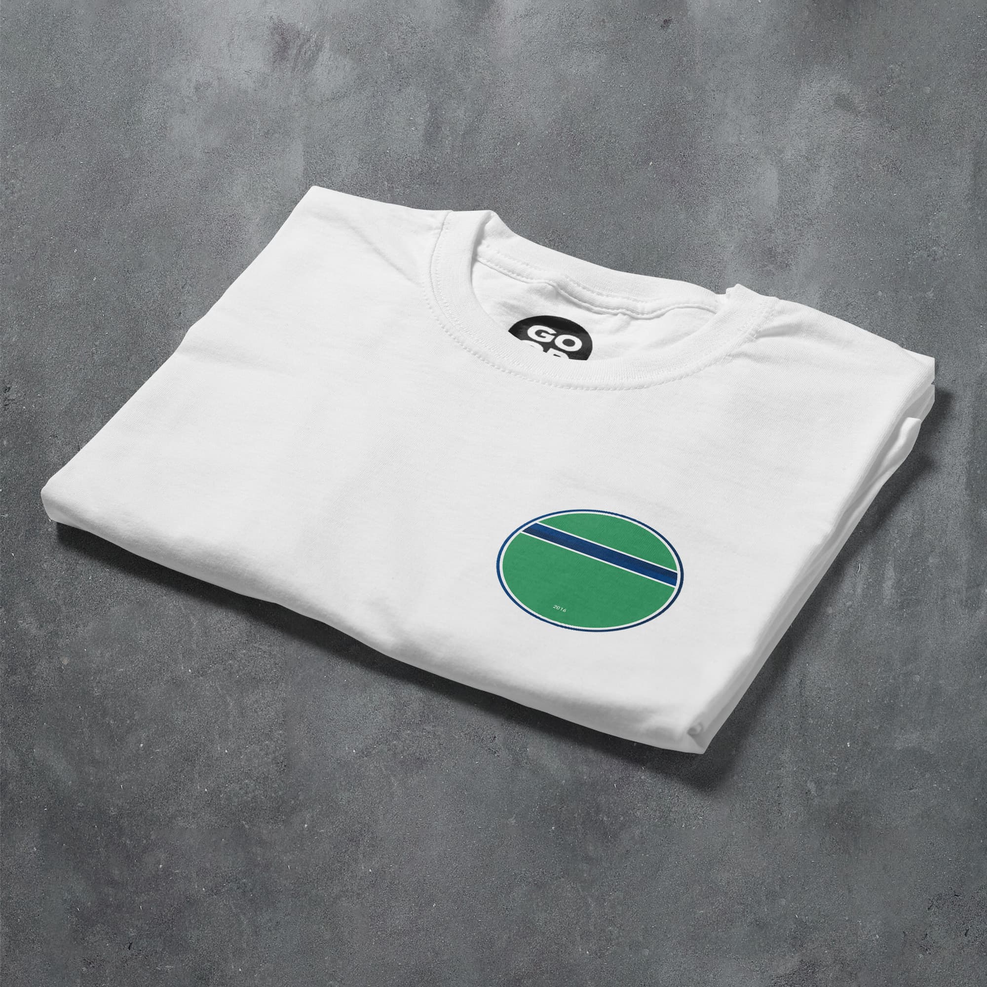 a white t - shirt with a green circle on it
