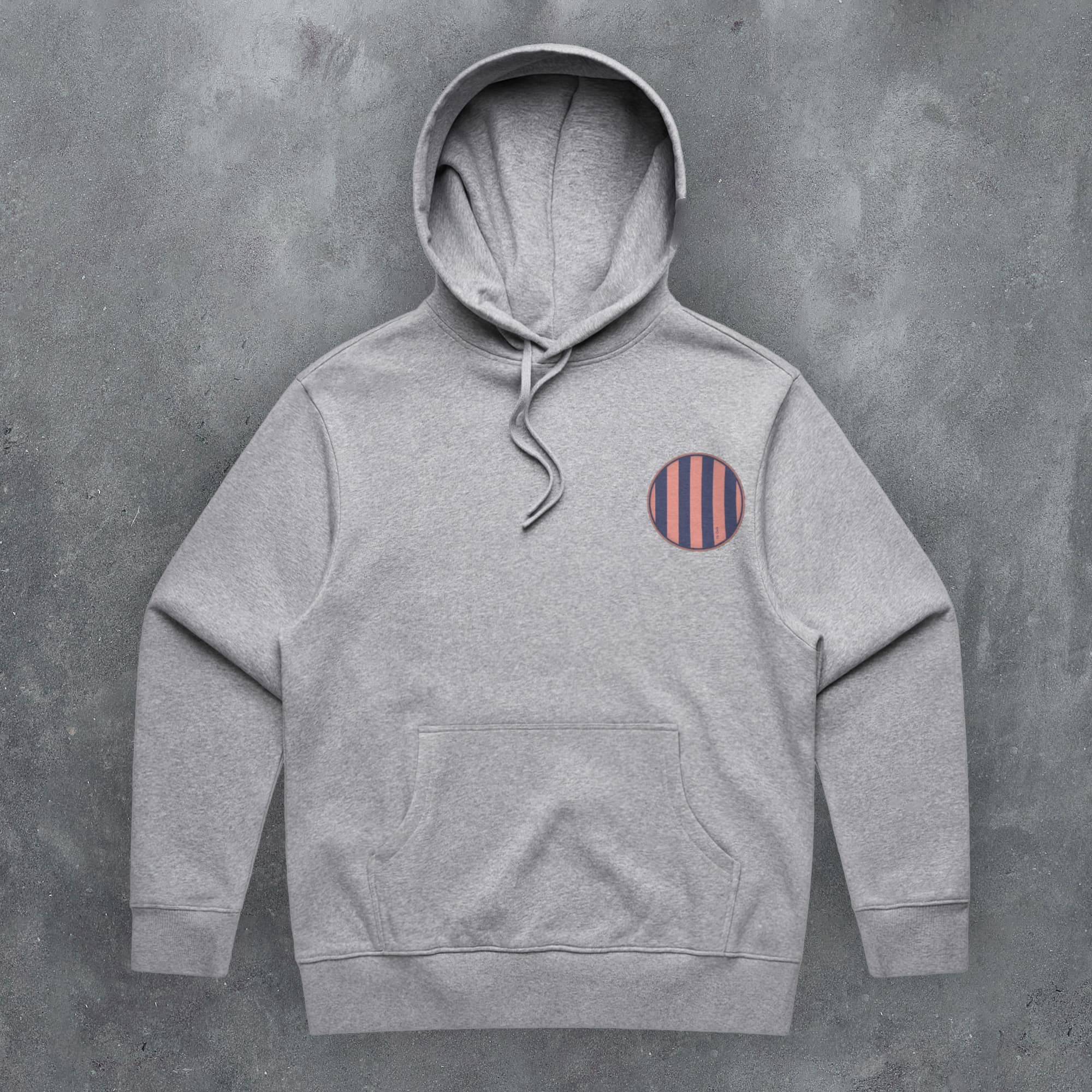 a grey hoodie with a striped patch on the chest