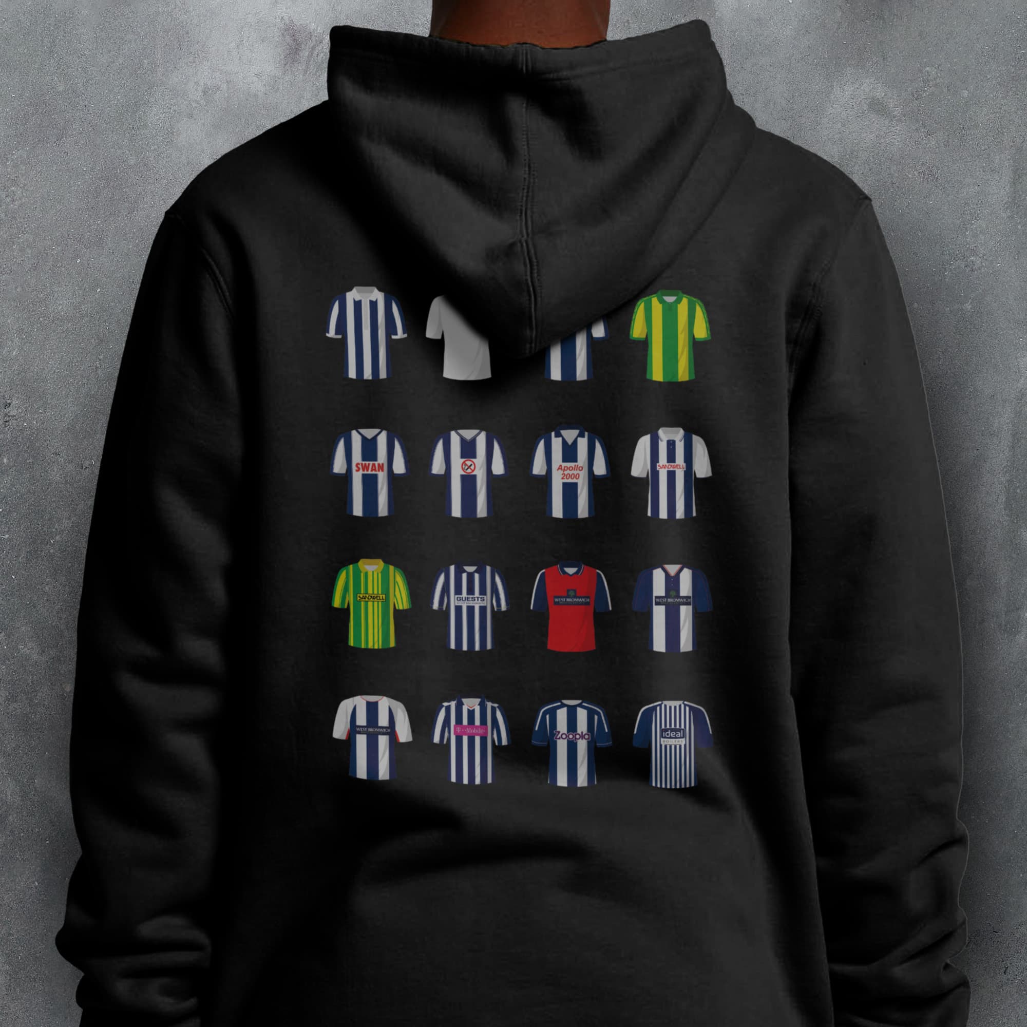 a person wearing a black hoodie with a bunch of different colored shirts on it