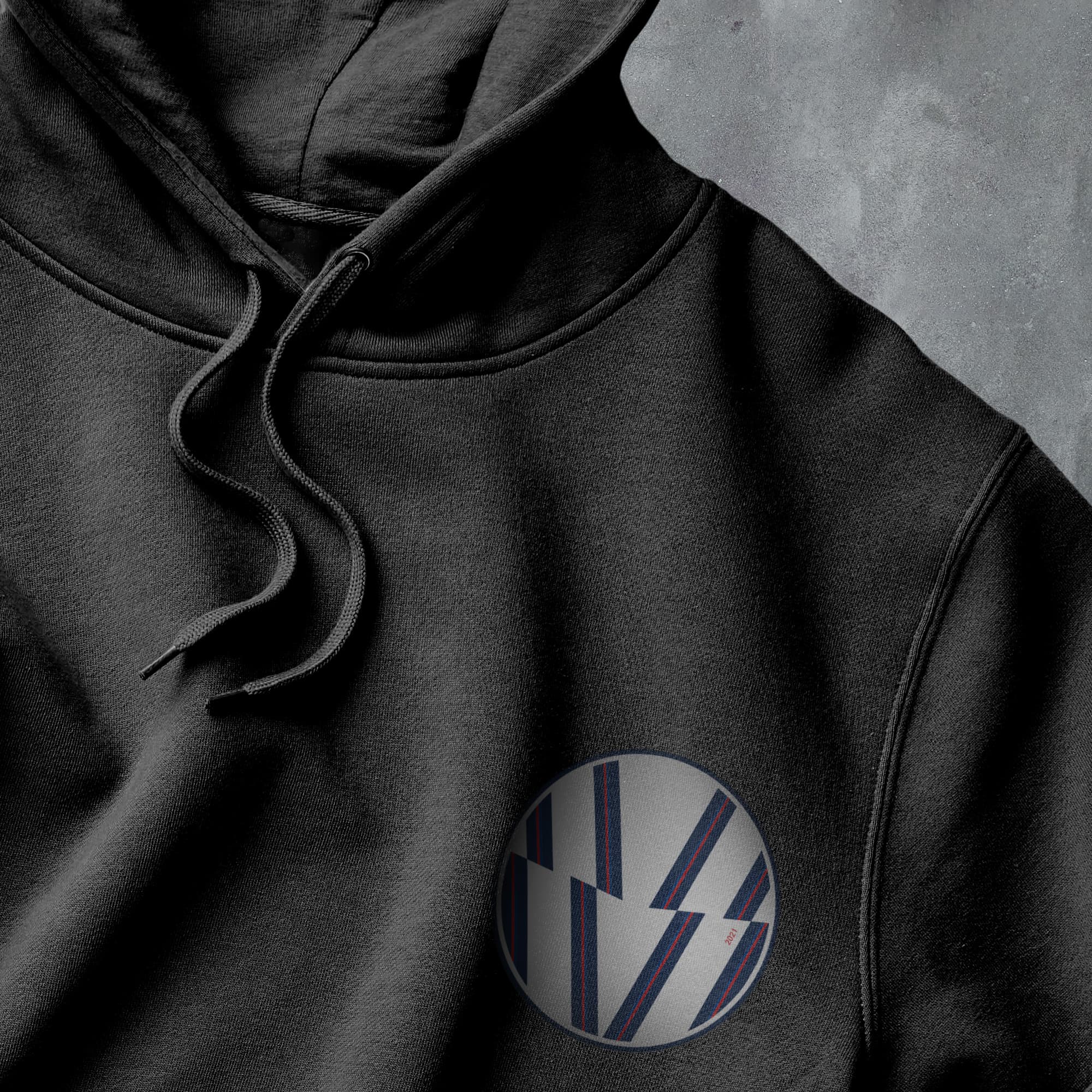 a close up of a hoodie with a logo on it