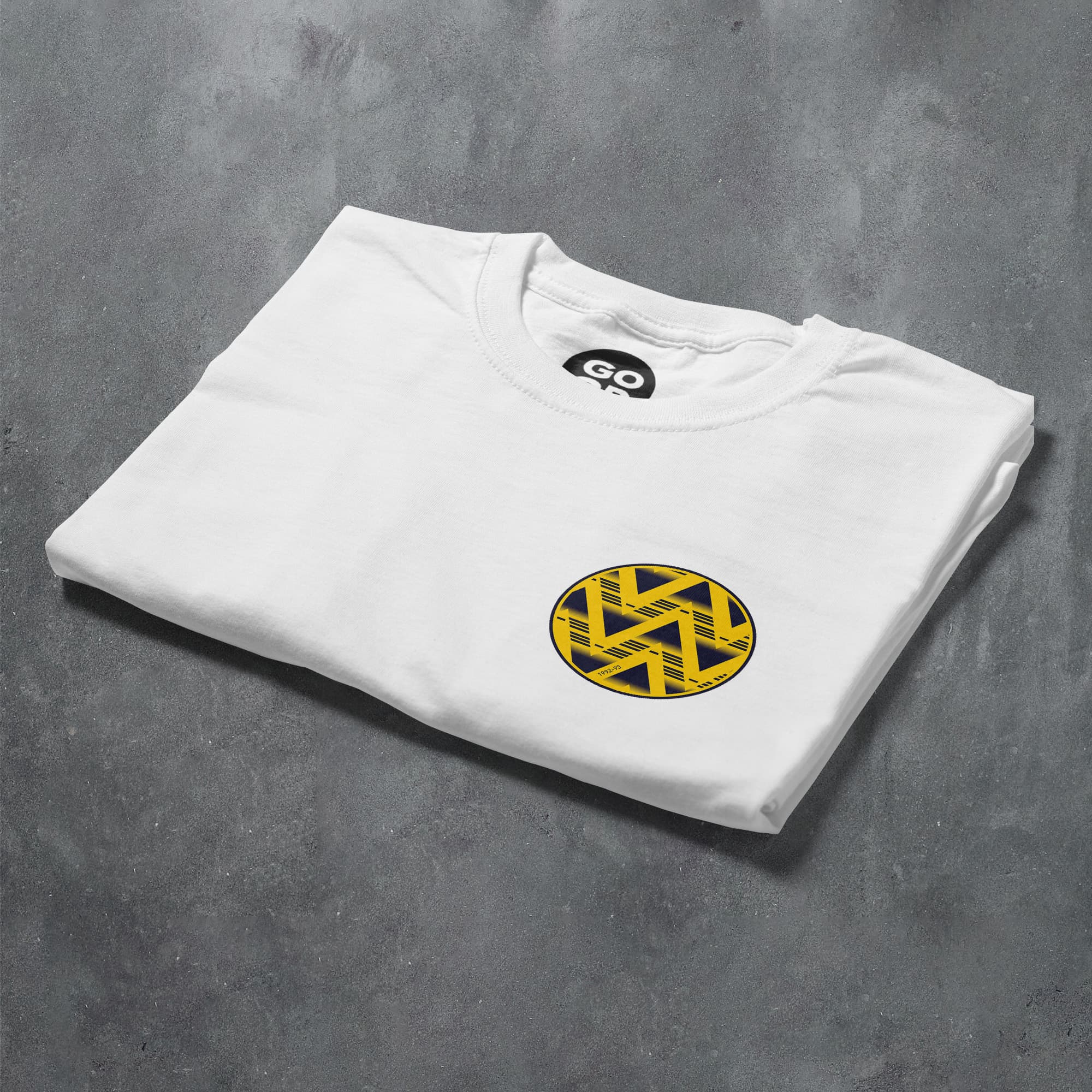 a white t - shirt with a yellow and black logo