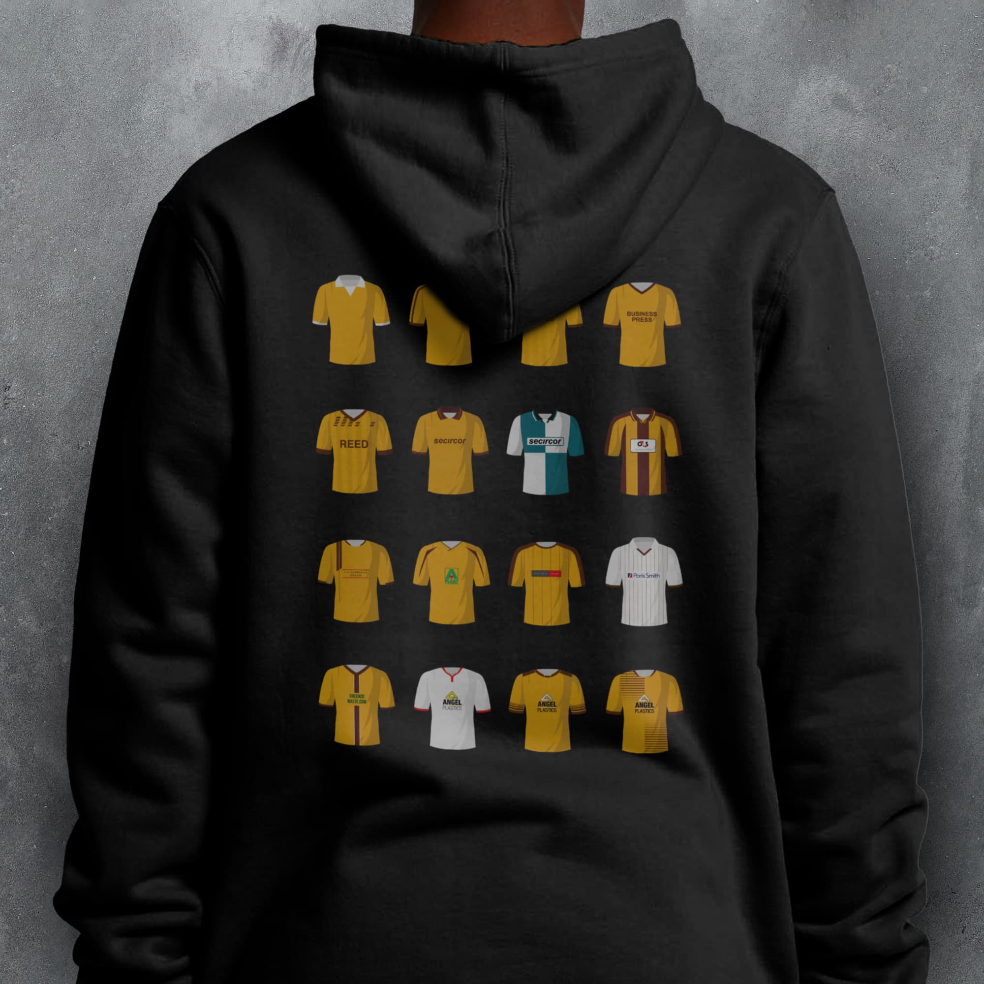 a person wearing a black hoodie with a bunch of different colored shirts on it