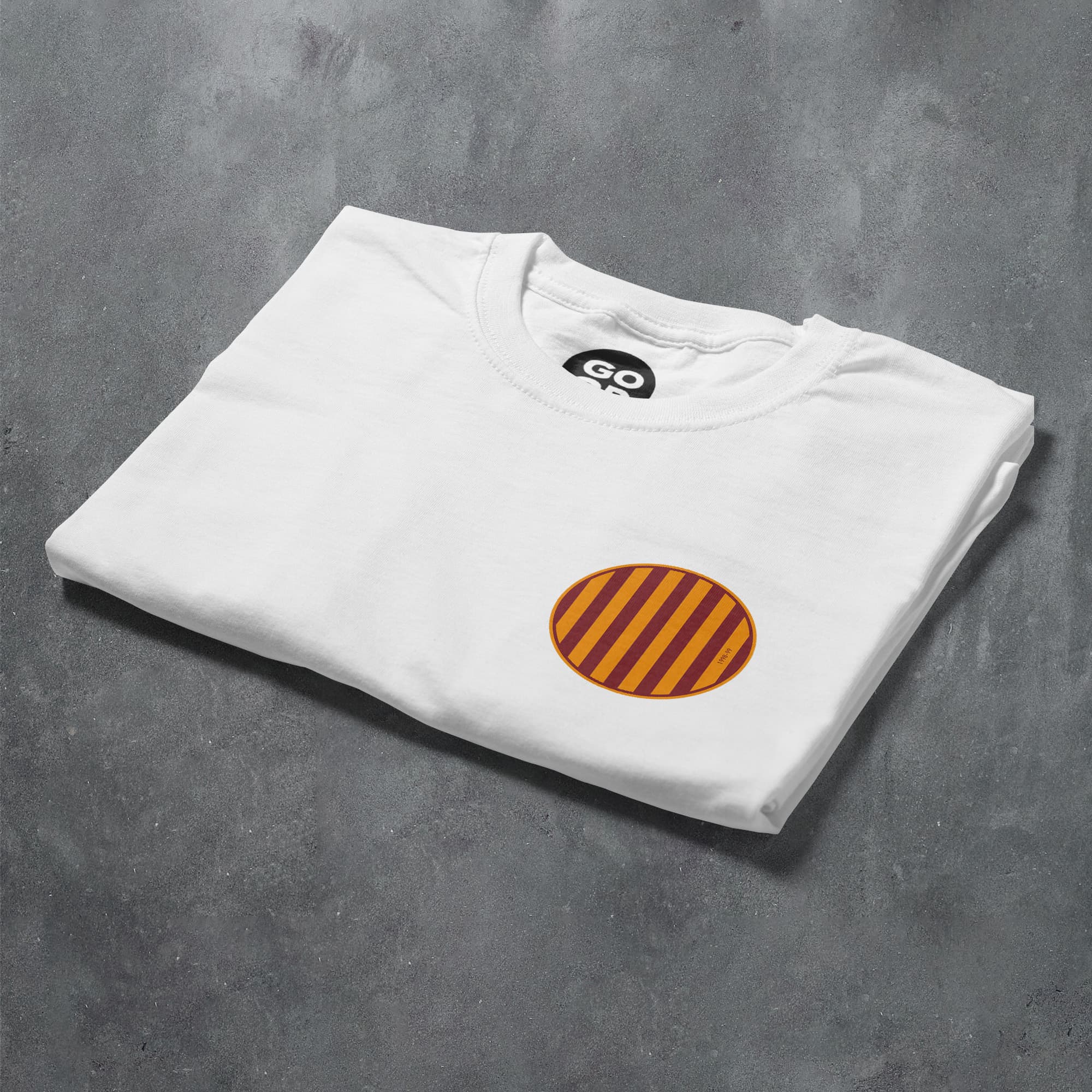 a white t - shirt with orange and yellow stripes