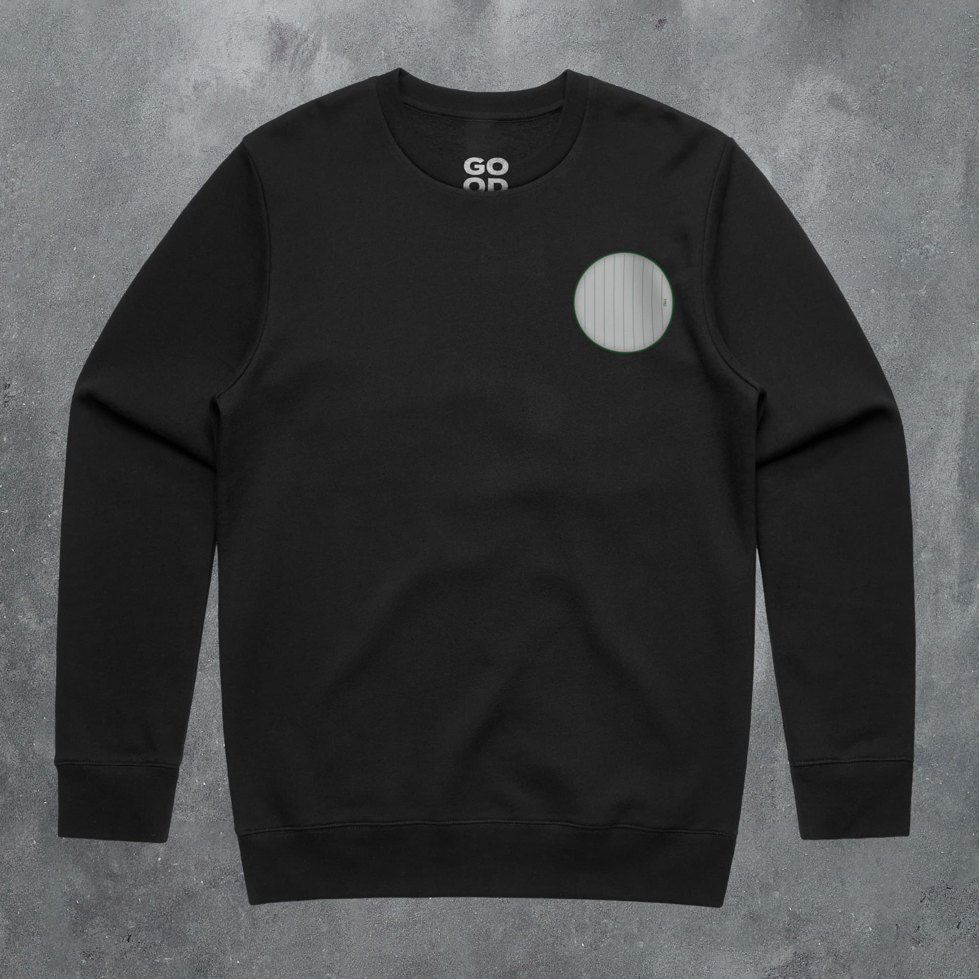 a black sweatshirt with a white circle on it