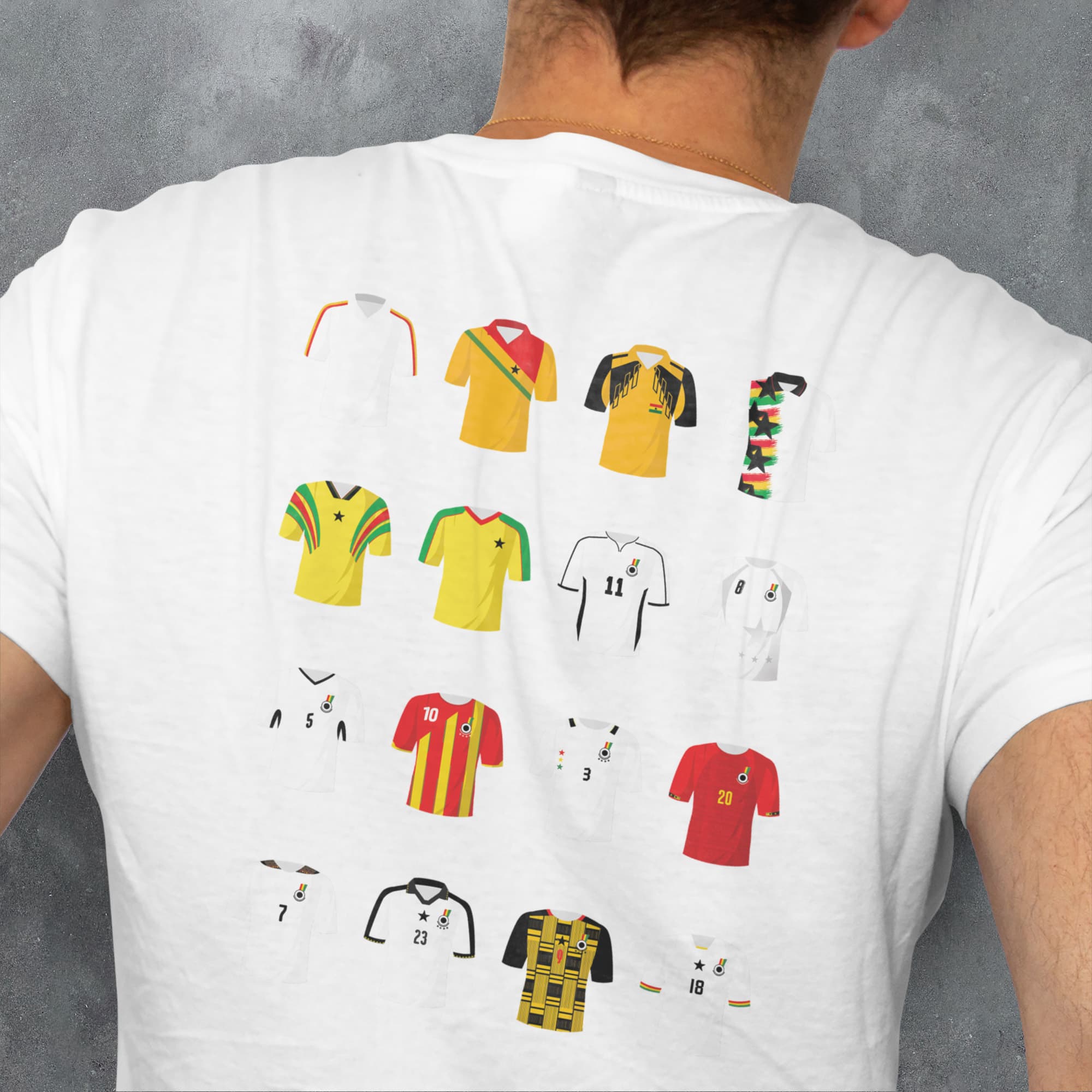 a man wearing a white t - shirt with a bunch of different shirts on it