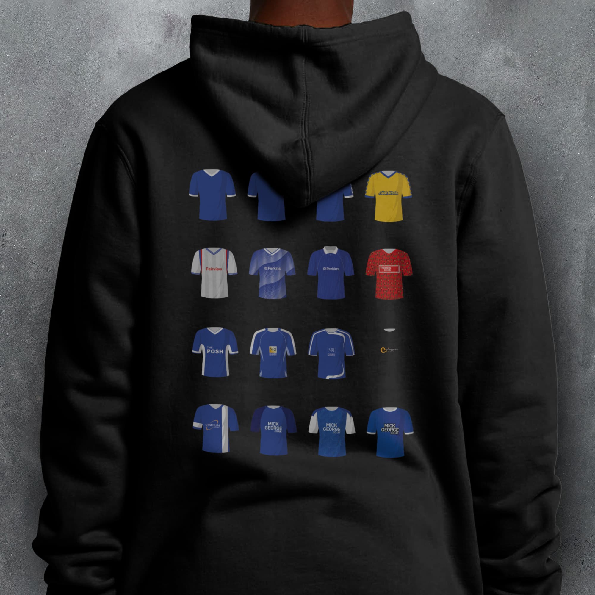 a person wearing a black hoodie with different colored shirts on it