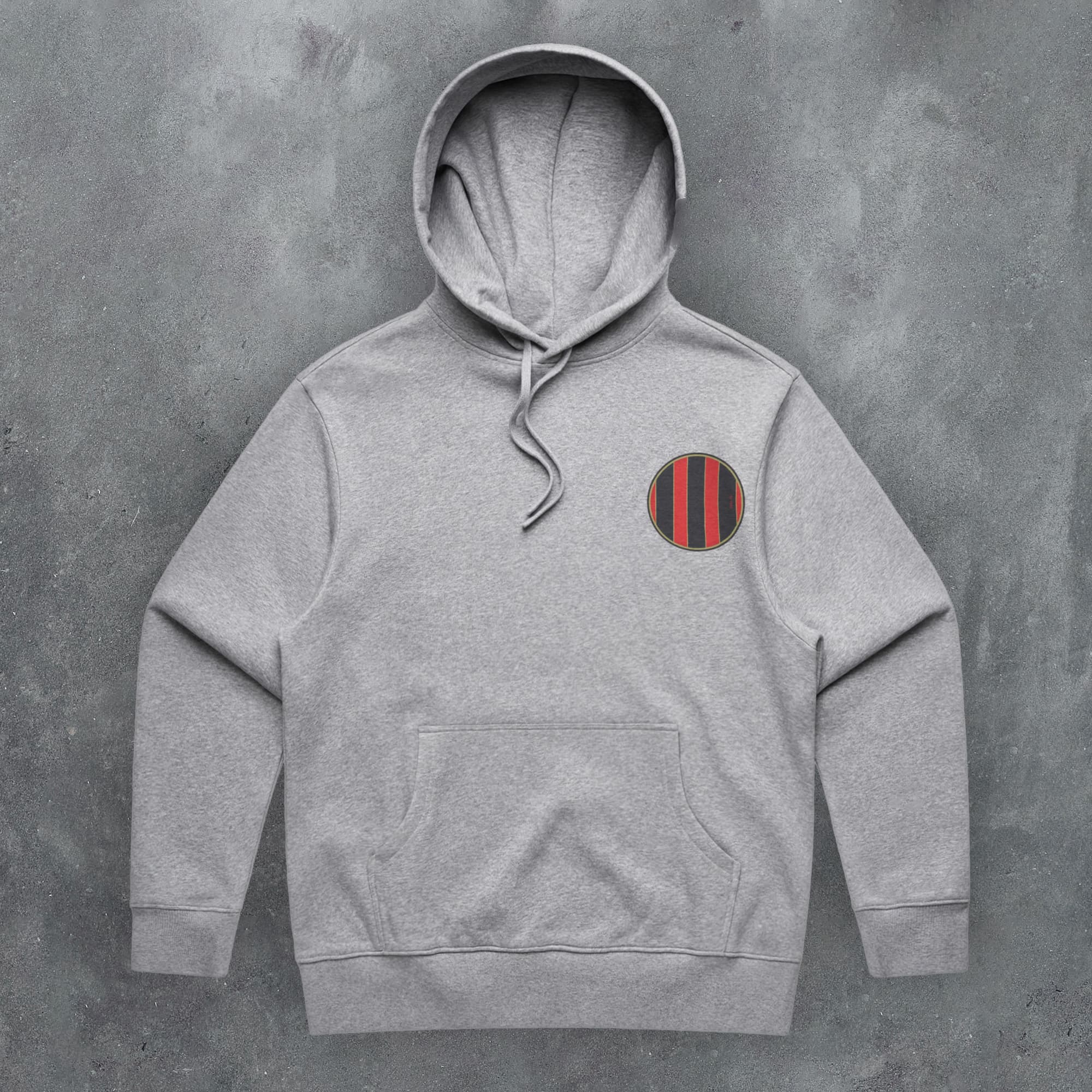 a grey hoodie with a red and black stripe on it