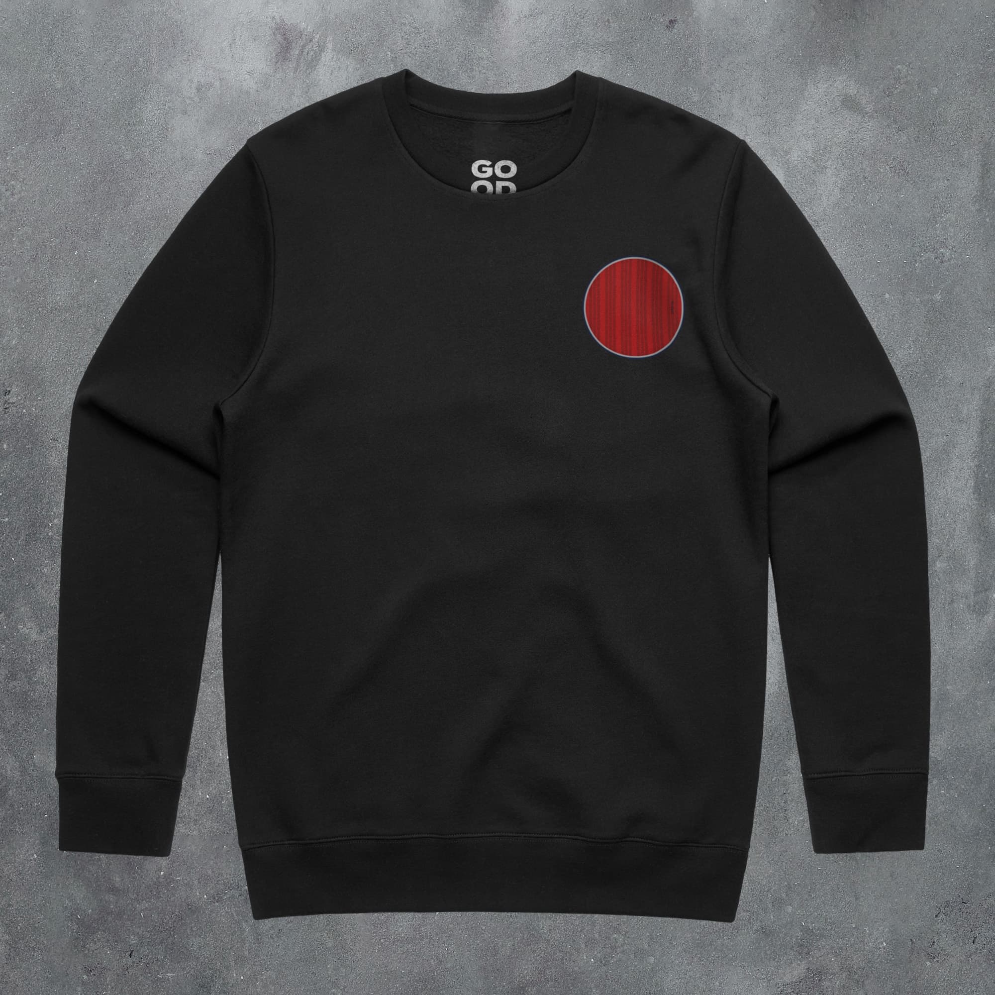 a black sweatshirt with a red circle on it