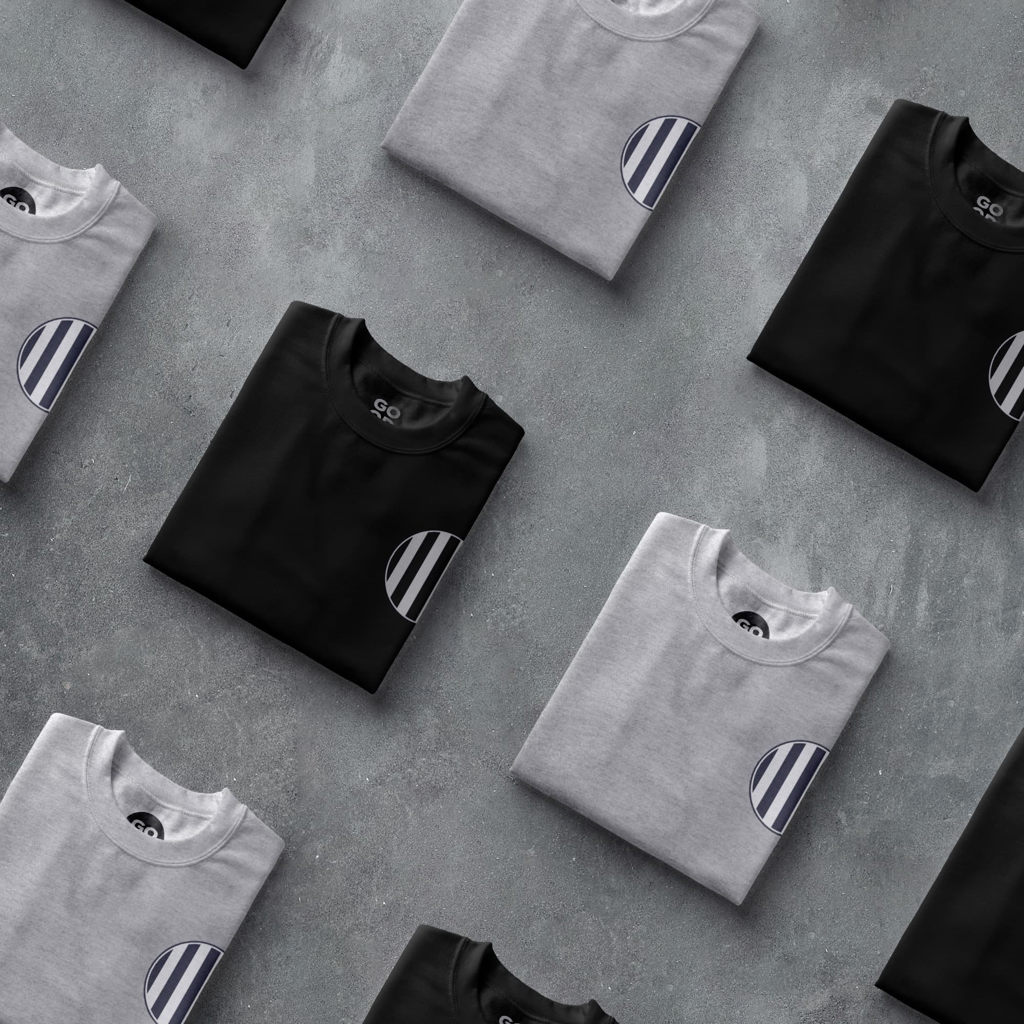 a group of black and white shirts sitting next to each other