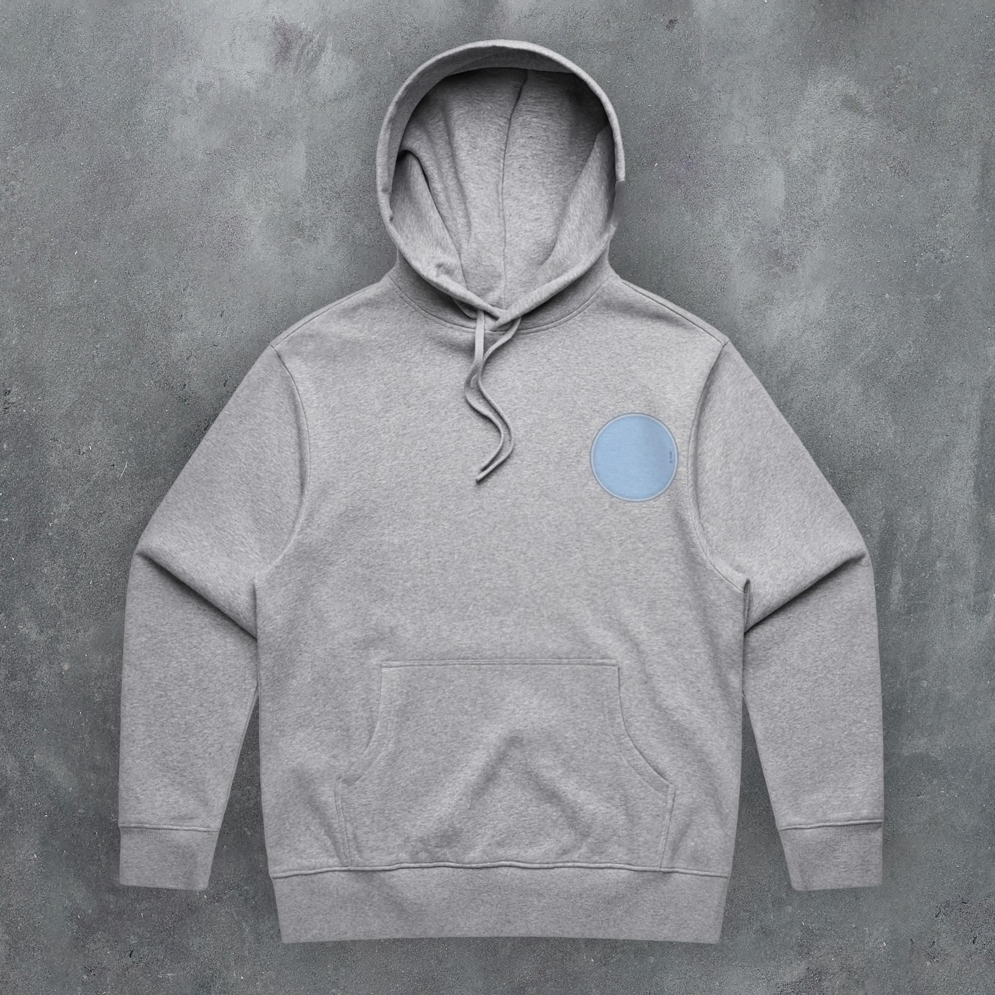 a grey hoodie with a blue circle on it