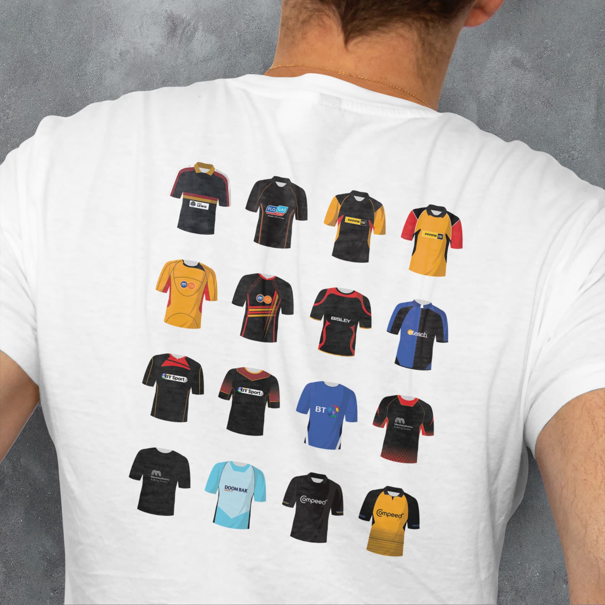 a man wearing a t - shirt with a bunch of different shirts on it