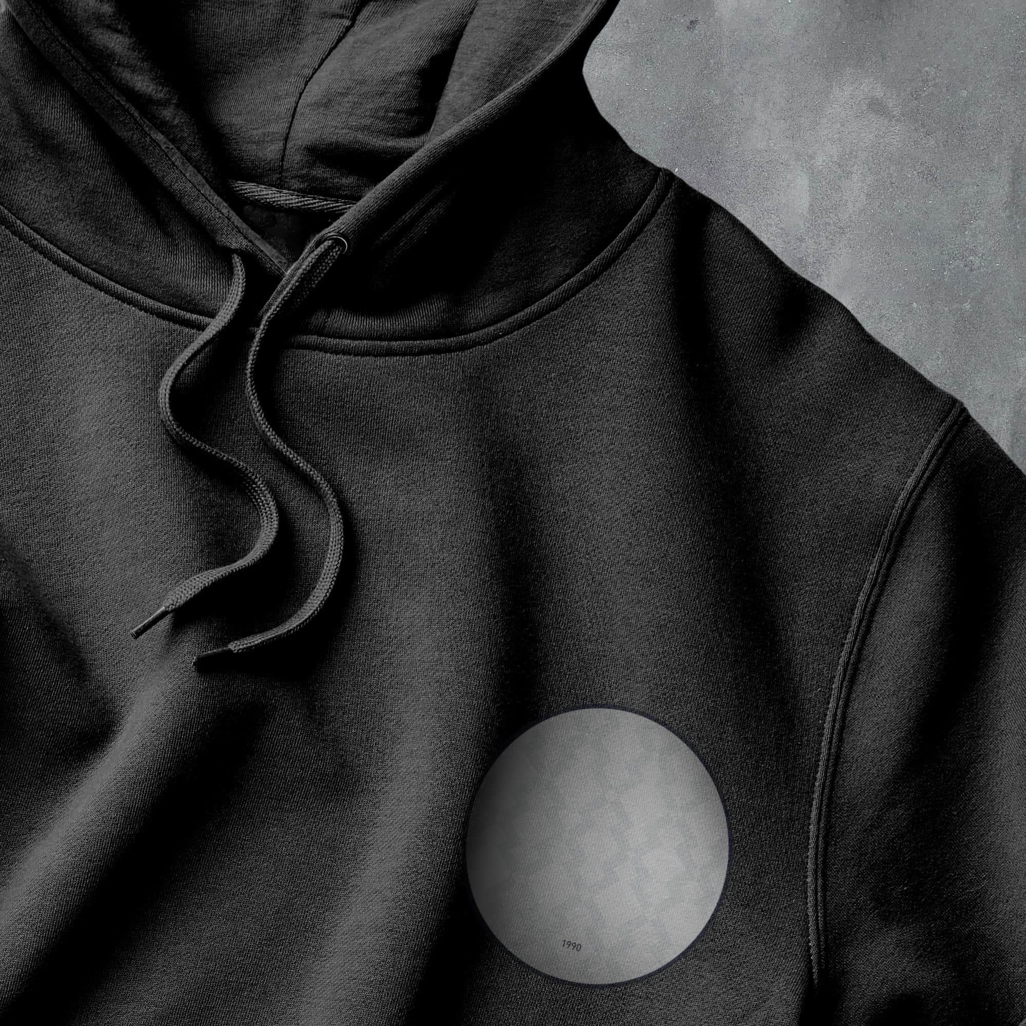 a black and white photo of a hoodie