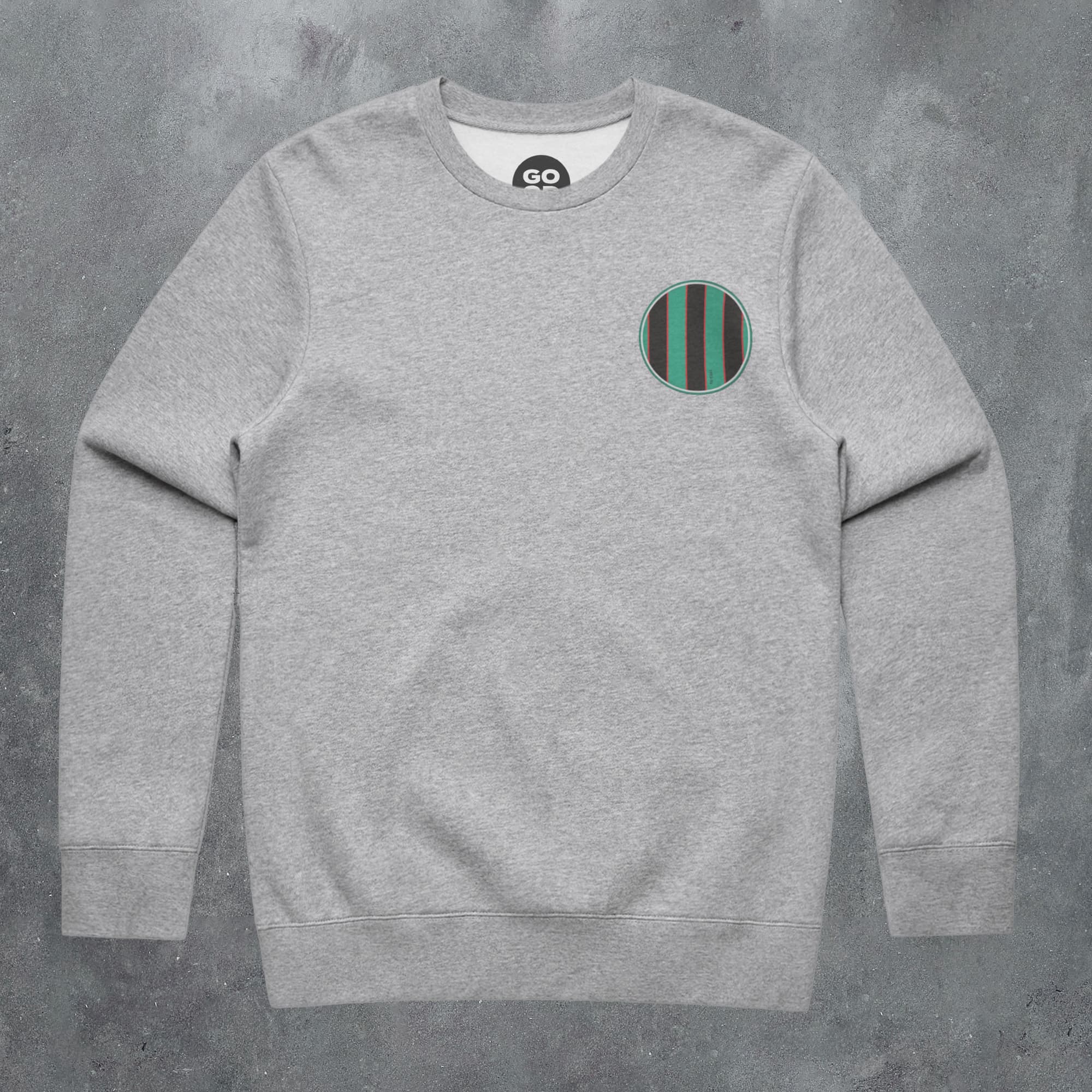 a grey sweatshirt with a green and black stripe on the chest