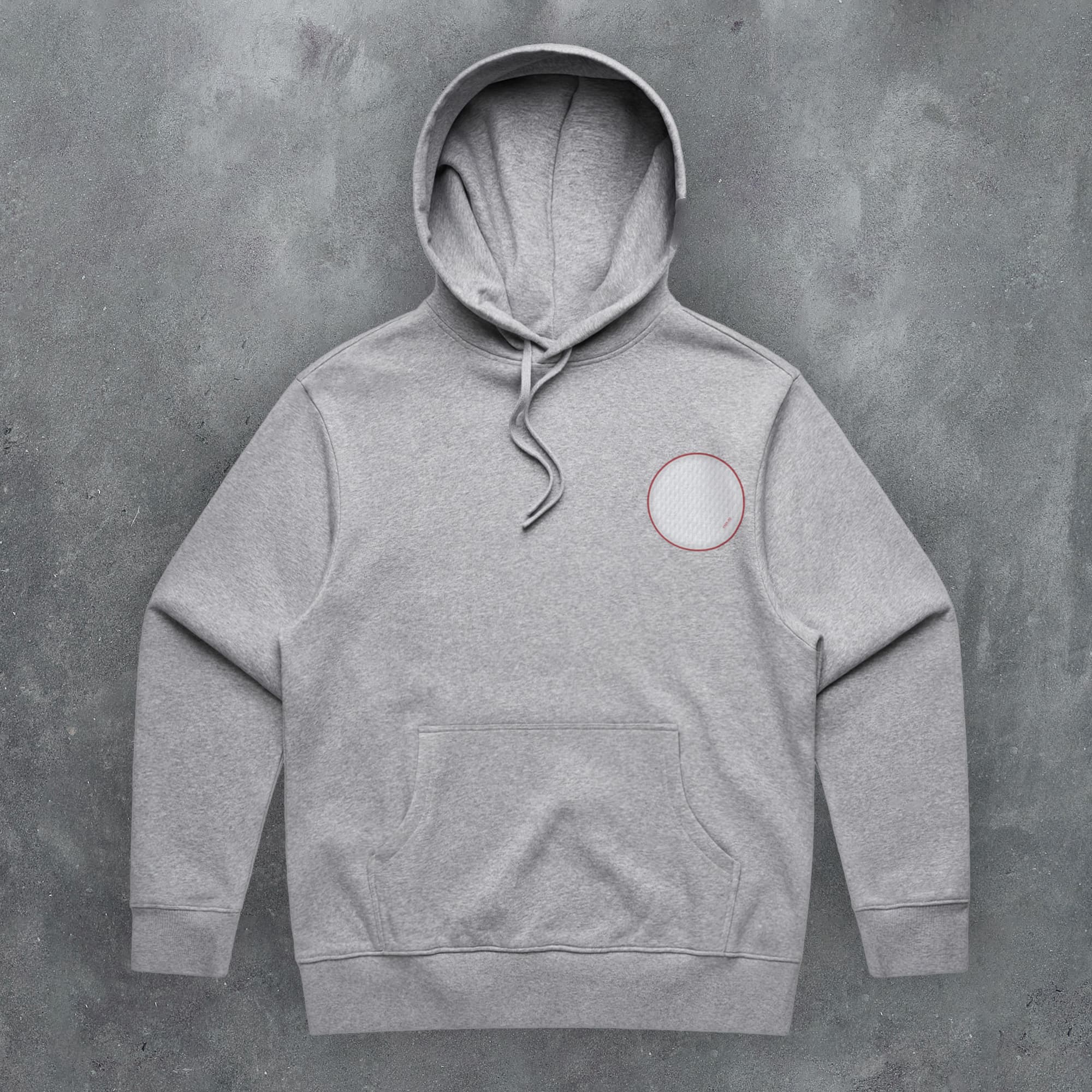 a grey hoodie with a white circle on it