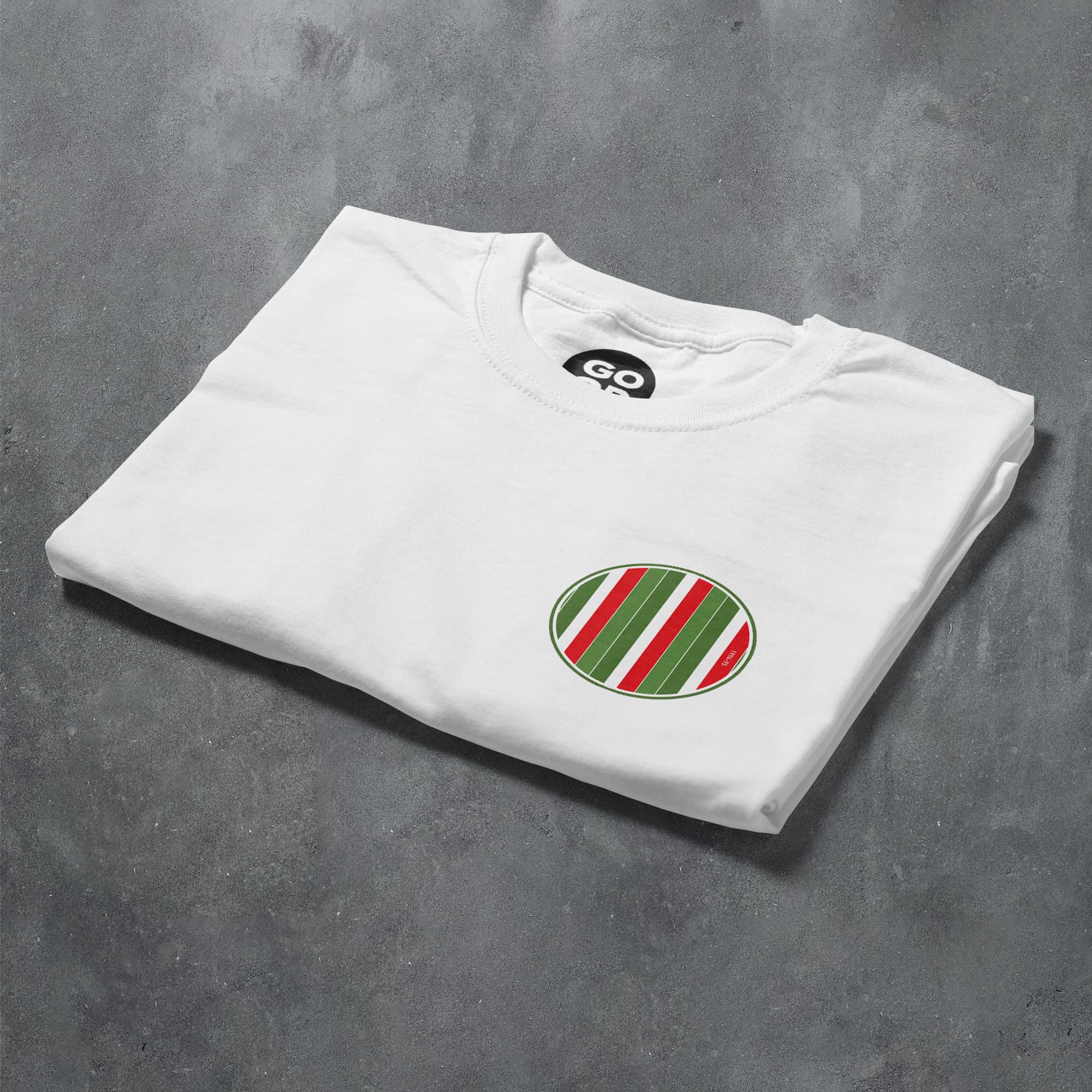 a white t - shirt with a green and red stripe on it