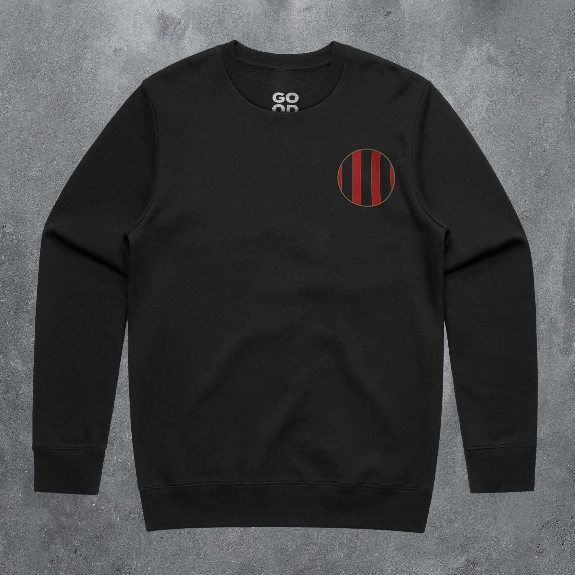 a black sweatshirt with a red and black stripe on the chest