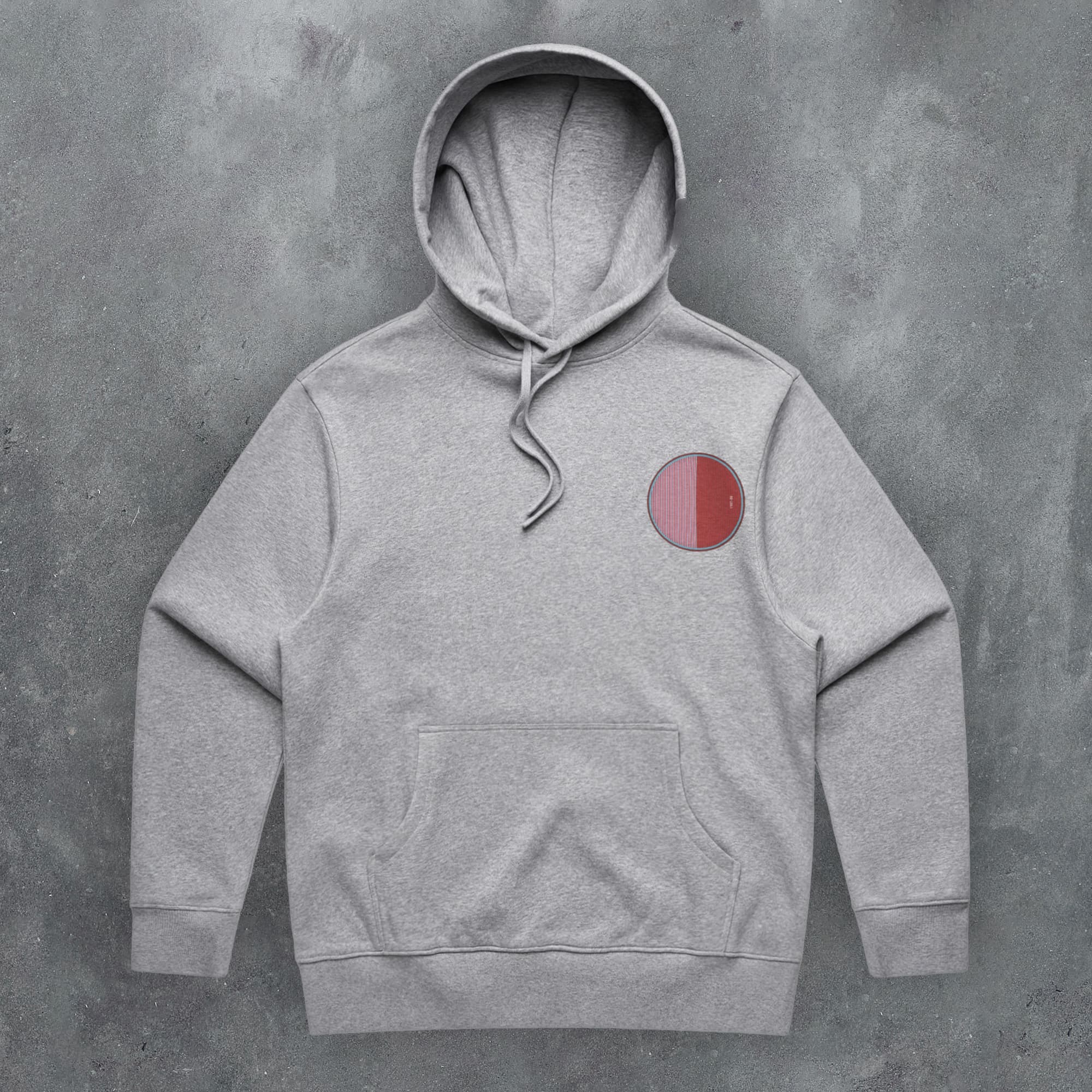 a grey hoodie with a red circle on it